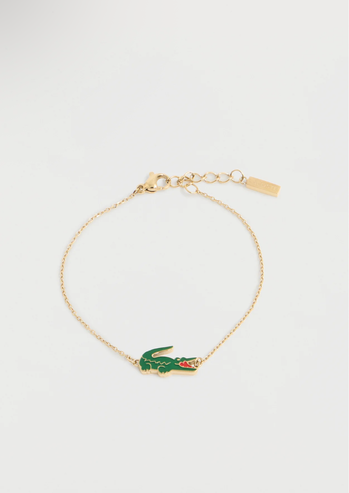 Bracelet Lacoste Crocodile Unisex doré avec crocodile émaillé vert et détail rouge sur chaîne fine